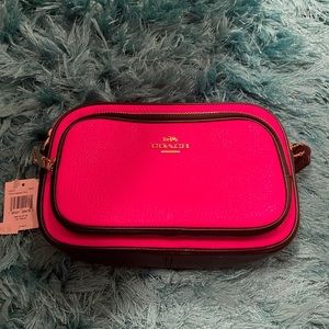 Brand new never used Fluorescent Pink Crossbody Coach bag